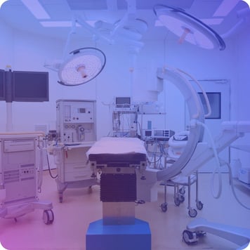 Operating room equipped with advanced medical devices and monitoring systems.